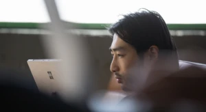 Person looking at computer.